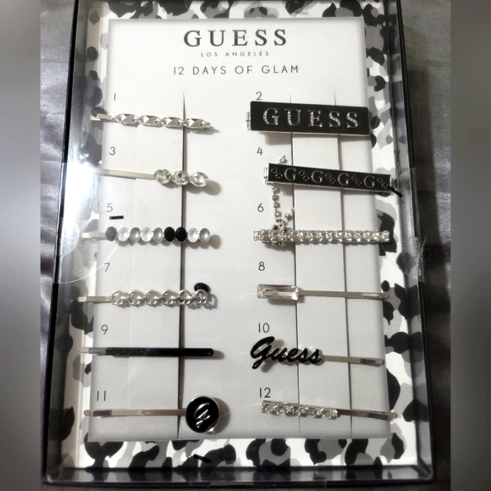 Guess Brand Hair Clip Pins They are silver and black and crystals that are not r